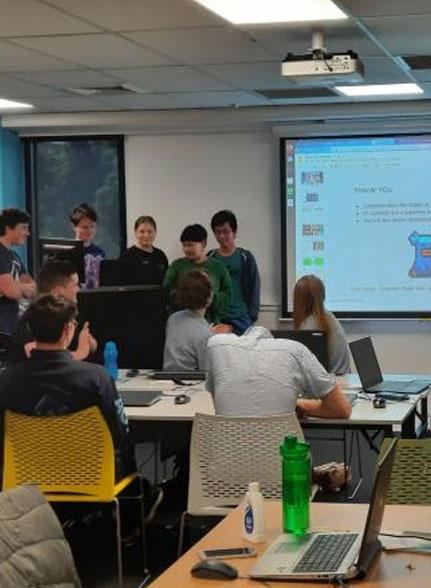 Open source academy students during a lesson