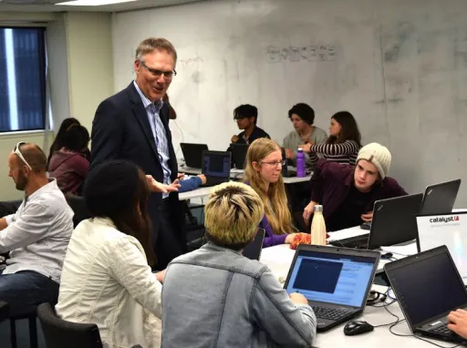 Director Don Christie talks with students at the 2019 Open Source Academy