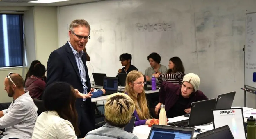 Director Don Christie talks with students at the 2019 Open Source Academy