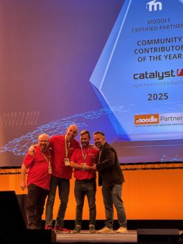 Moodle presents Catalyst with LMS Contributor of the Year award on stage