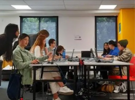 Students learning to code at the Open Source Academy