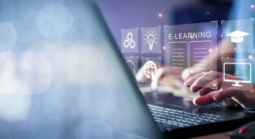 A person at a laptop completing eLearning