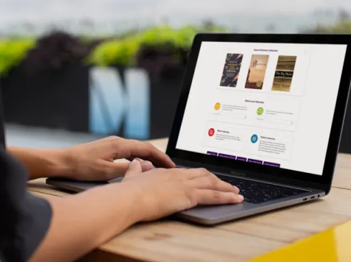 person looking at the new Horowhenua site on a laptop and mobile v2