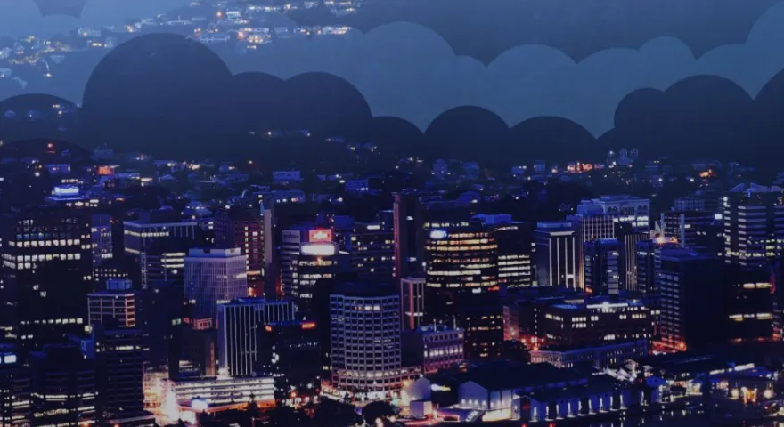 Illustrated clouds hover over a dimly lit city