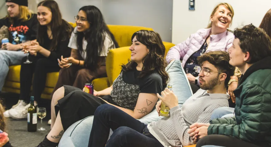 A small group of the Catalyst team sat together 
