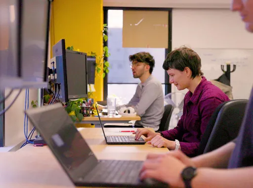 people working on laptops