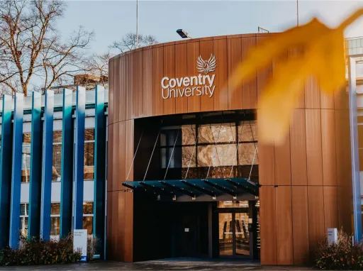 Conventry University builing surrounded by trees