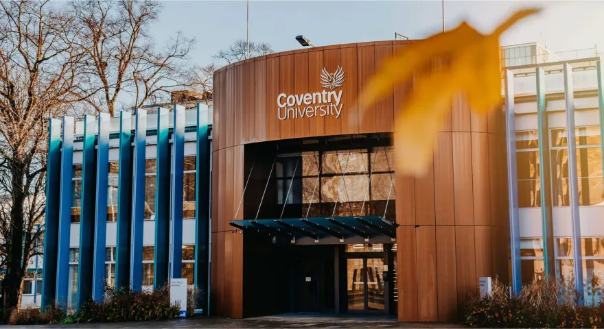 Conventry University builing surrounded by trees
