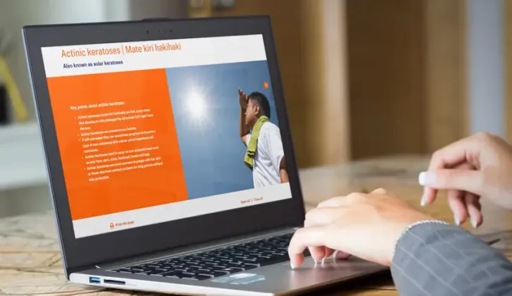 A laptop displays Healthifys website displaying the results for Actinic keratoses