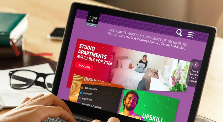 Laptop open on AUT website