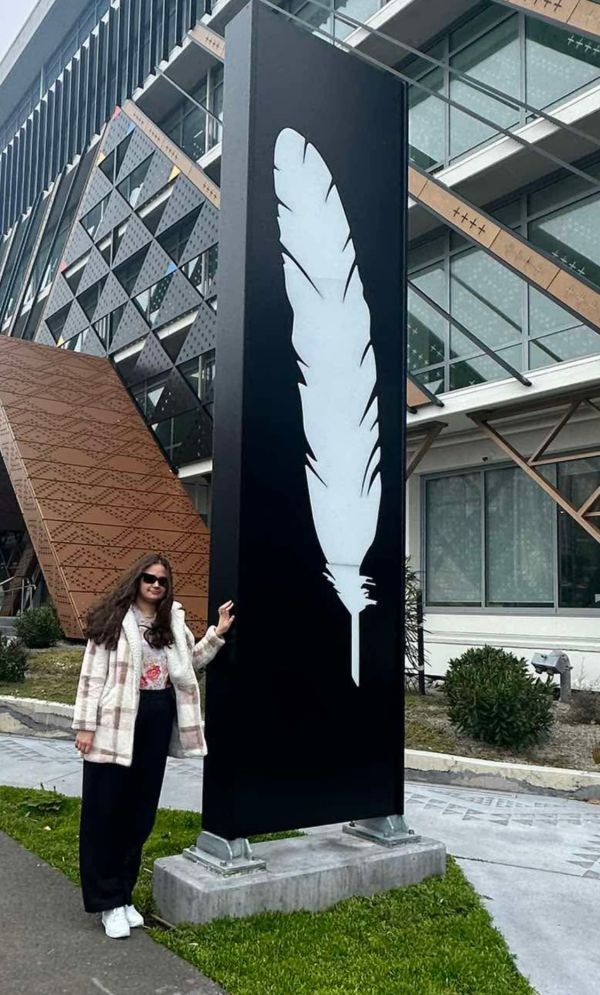 Te Wainui stands next to the Ngāmotu house 