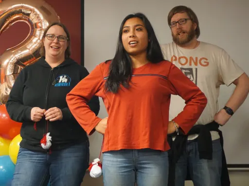 Three Catalyst employees practicing Kapa Haka