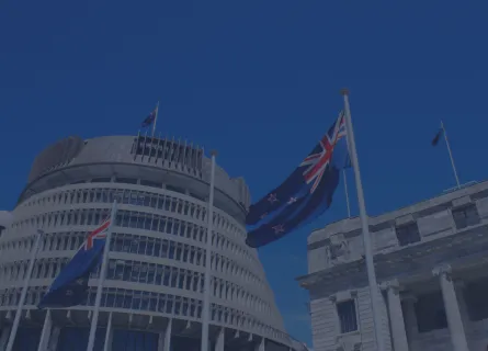 Beehive in Wellington with NZ flag