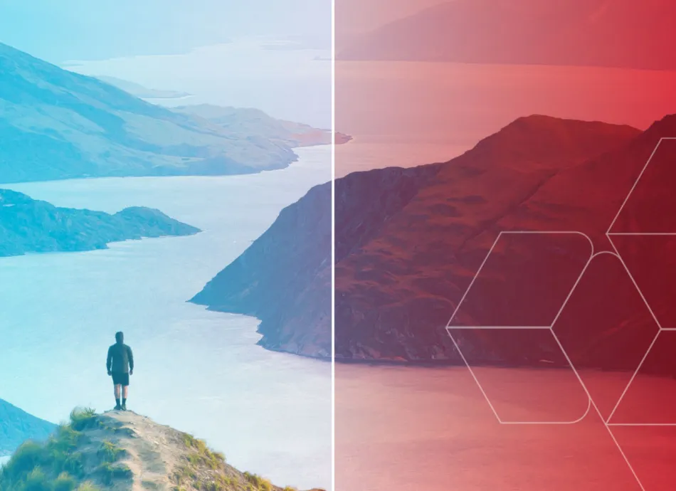 A man stood at the top of a mountain in New Zealand