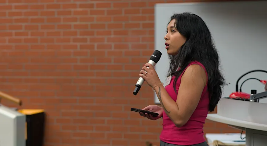 Aleisha speaking at KohaCon 25