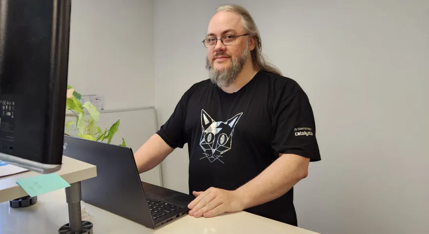 Dr David Thompson working on a laptop