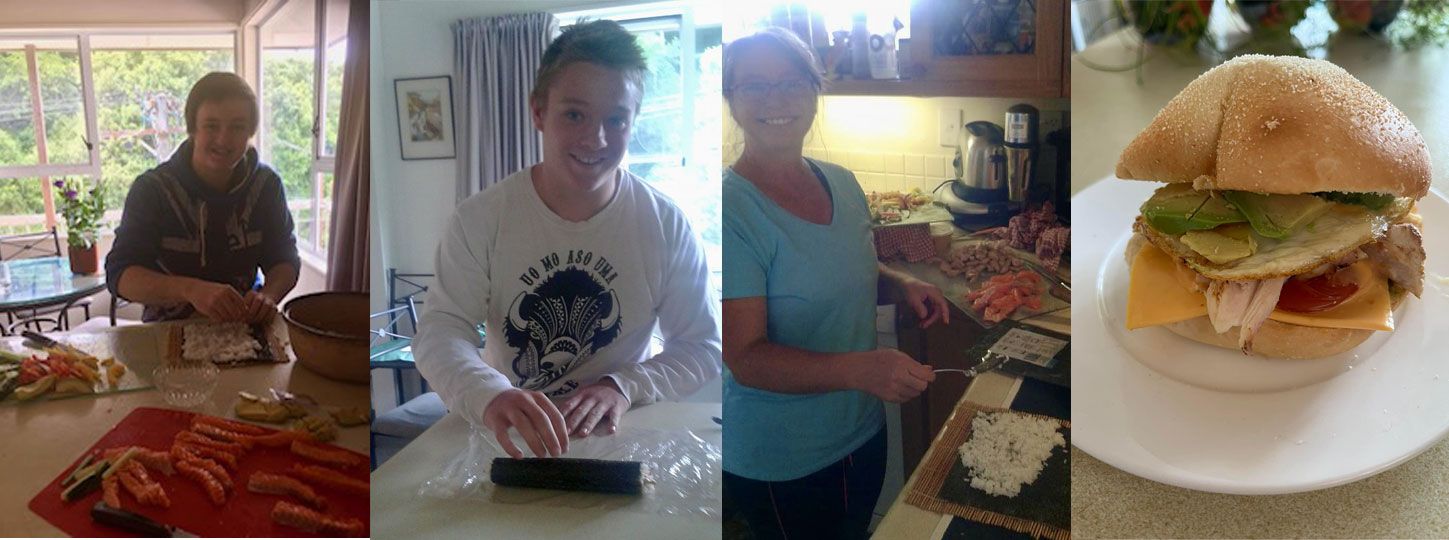 a mother and her 2 sons making sushi on christmas