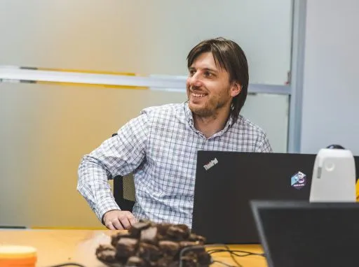 man with laptop in meeting
